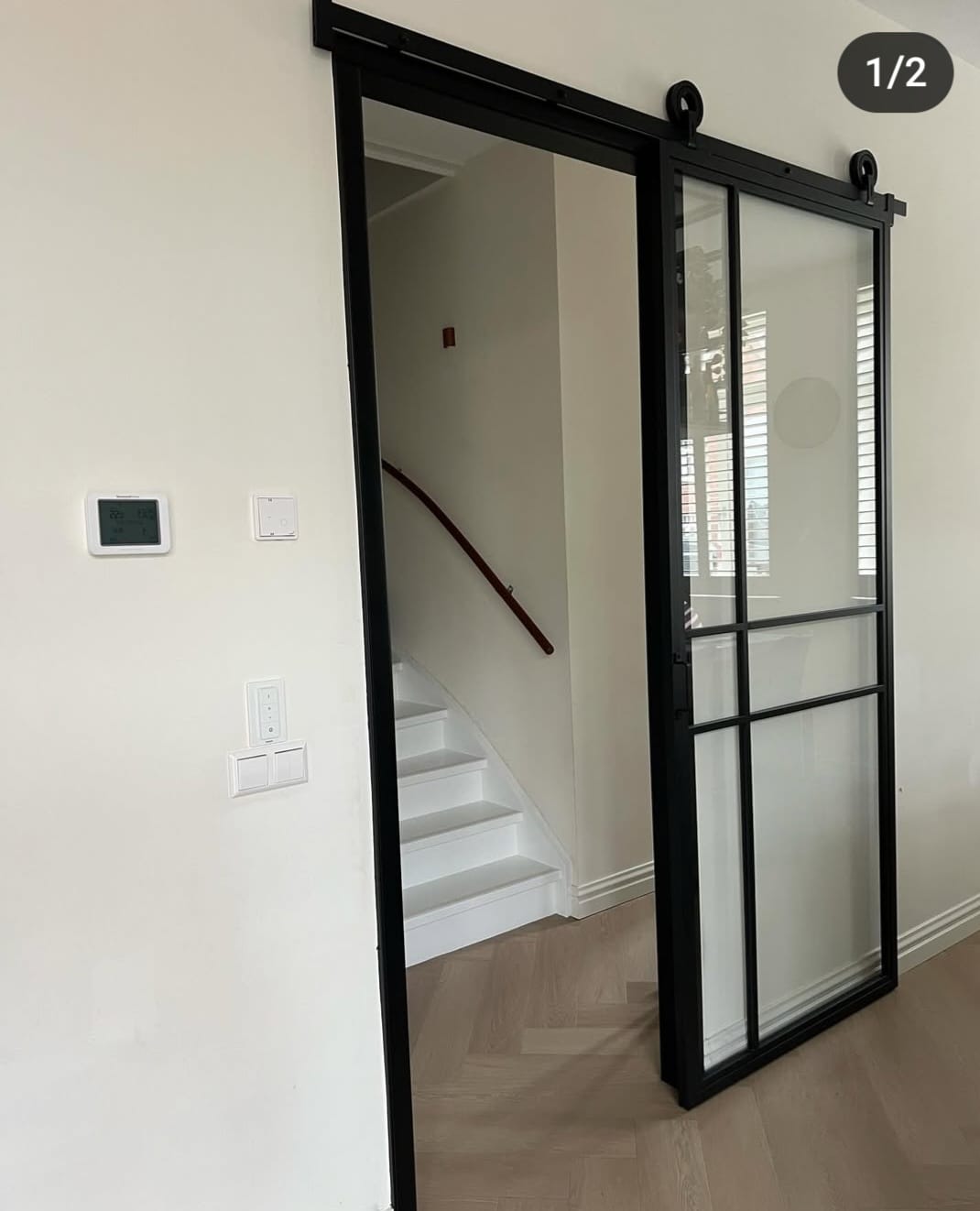 Maatwerk stalen schuifdeur met glas